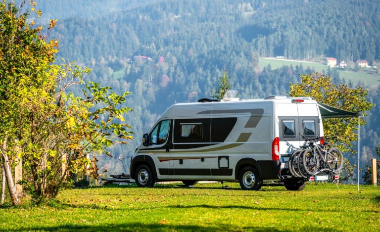 Campervan,Or,Motorhome,With,Bicycle,Rack,Parked,In,The,Nature